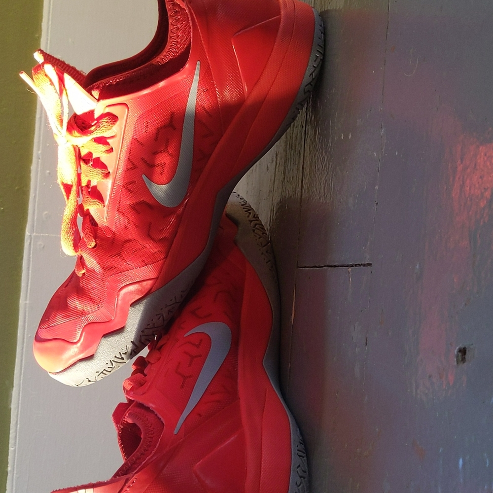Available. Excellent condition.Red Nike "crusader" shoes